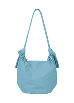 A detail shot of the GOOD GOODS ISSEY MIYAKE FUWA FUWA .