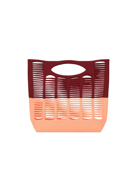 A product shot of the GOOD GOODS ISSEY MIYAKE MOKKO BI-COLOR bag in bordeaux×ligth salmon.