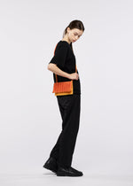 A model wears the GOOD GOODS ISSEY MIYAKE MOKKO BI-COLOR mokko-bi-color-3.
