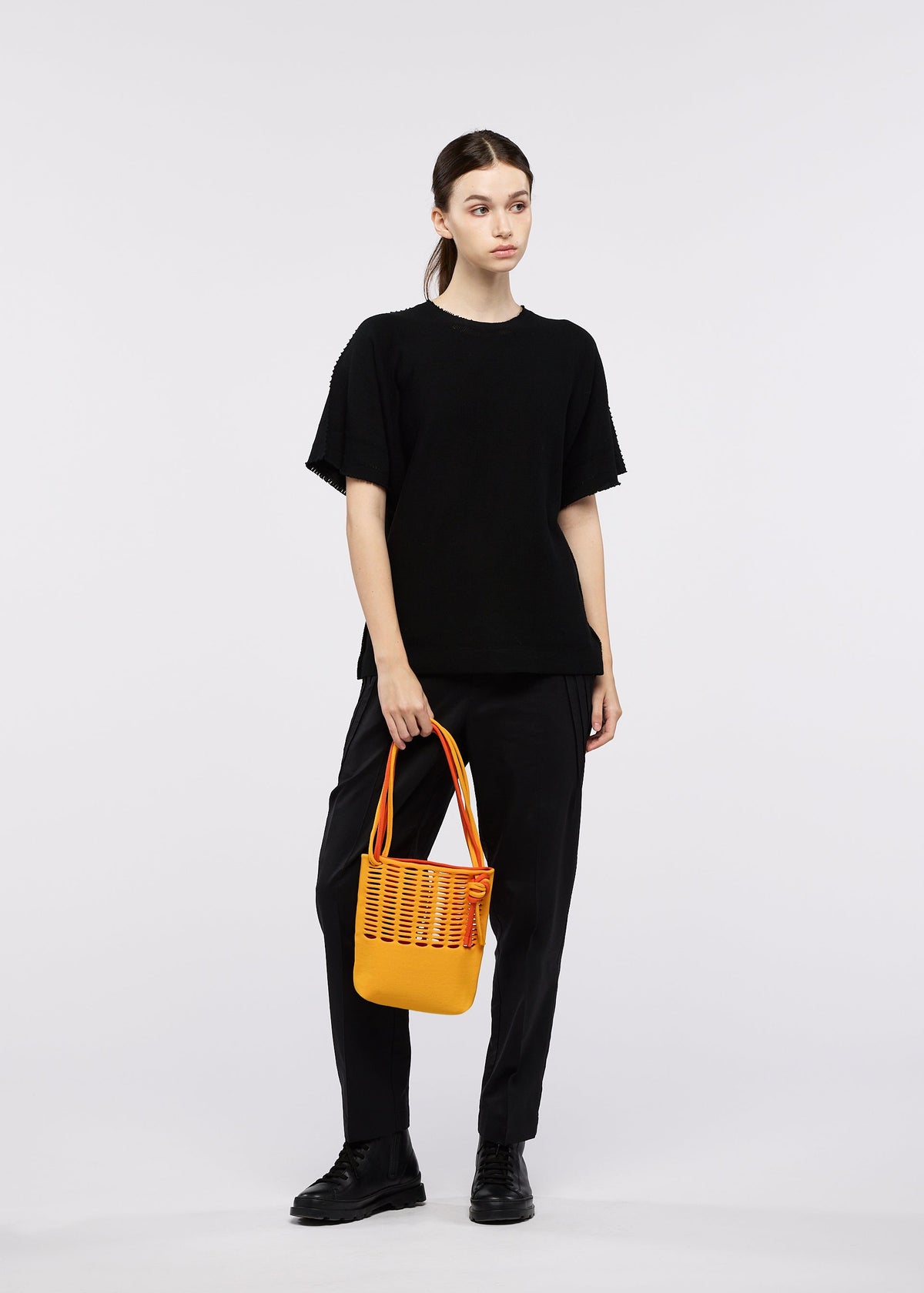 A model wears the GOOD GOODS ISSEY MIYAKE MOKKO BI-COLOR mokko-bi-color-3.