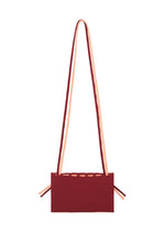 A detail shot of the GOOD GOODS ISSEY MIYAKE MOKKO BI-COLOR bag.