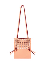 A detail shot of the GOOD GOODS ISSEY MIYAKE MOKKO BI-COLOR bag.