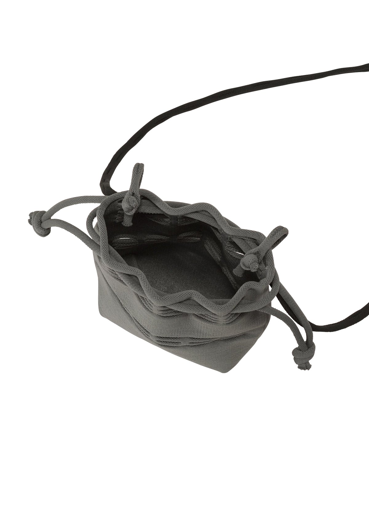 A detail shot of the GOOD GOODS ISSEY MIYAKE MOKKO POCKET BI-COLOR bag.