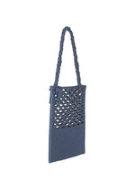 A detail shot of the GOOD GOODS ISSEY MIYAKE MOKKO WASHI bag.
