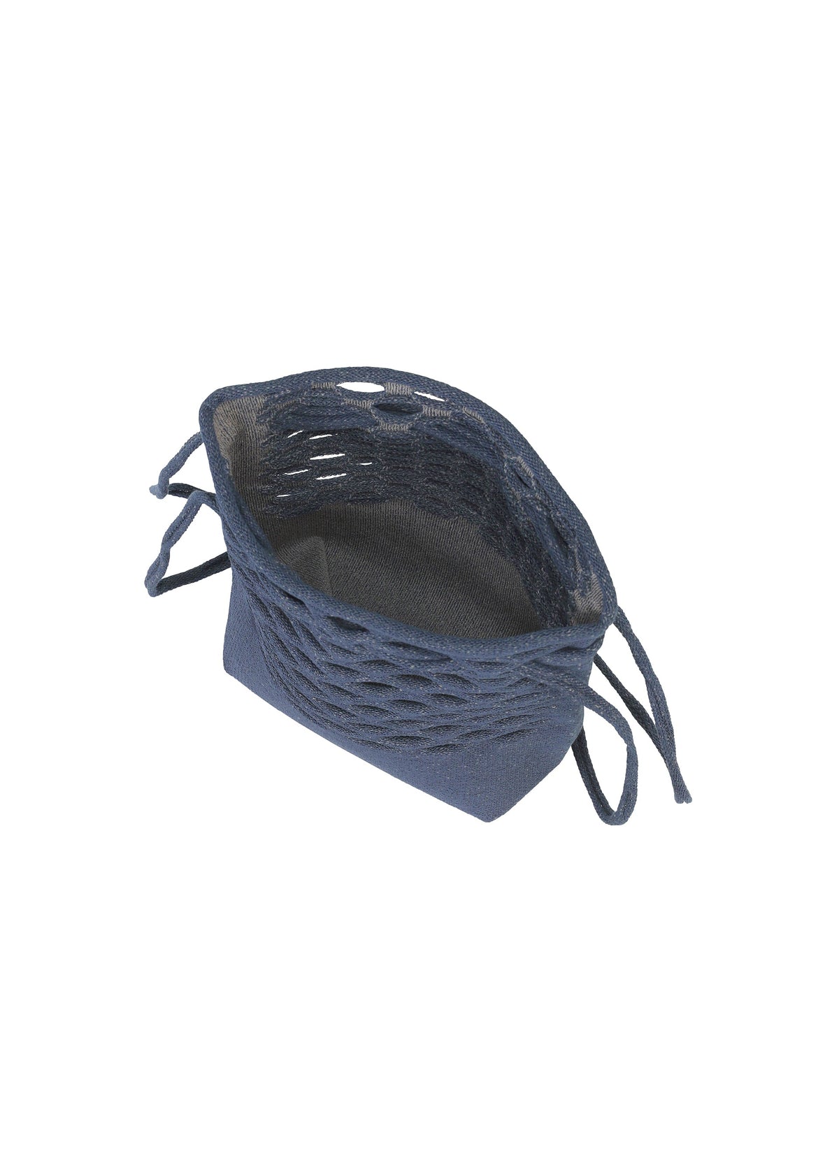A detail shot of the GOOD GOODS ISSEY MIYAKE MOKKO WASHI bag.