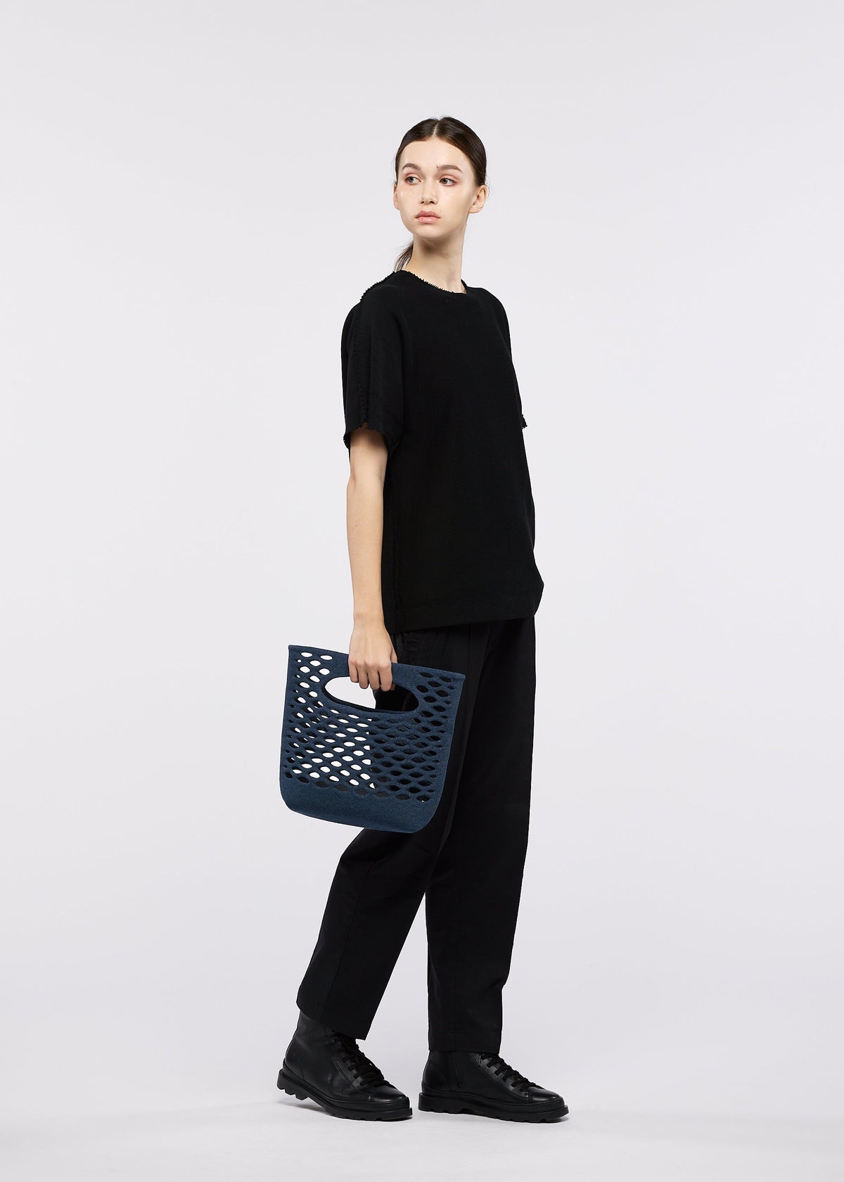 A model wears the GOOD GOODS ISSEY MIYAKE MOKKO WASHI mokko-washi-1.
