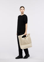 A model wears the GOOD GOODS ISSEY MIYAKE MOKKO WASHI mokko-washi-2.