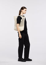 A model wears the GOOD GOODS ISSEY MIYAKE MOKKO WASHI mokko-washi-2.