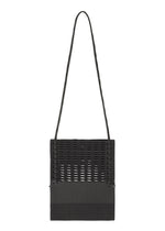A product shot of the GOOD GOODS ISSEY MIYAKE MOKKO KNOT bag in black mix.