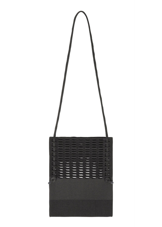 A product shot of the GOOD GOODS ISSEY MIYAKE MOKKO KNOT bag in black mix.