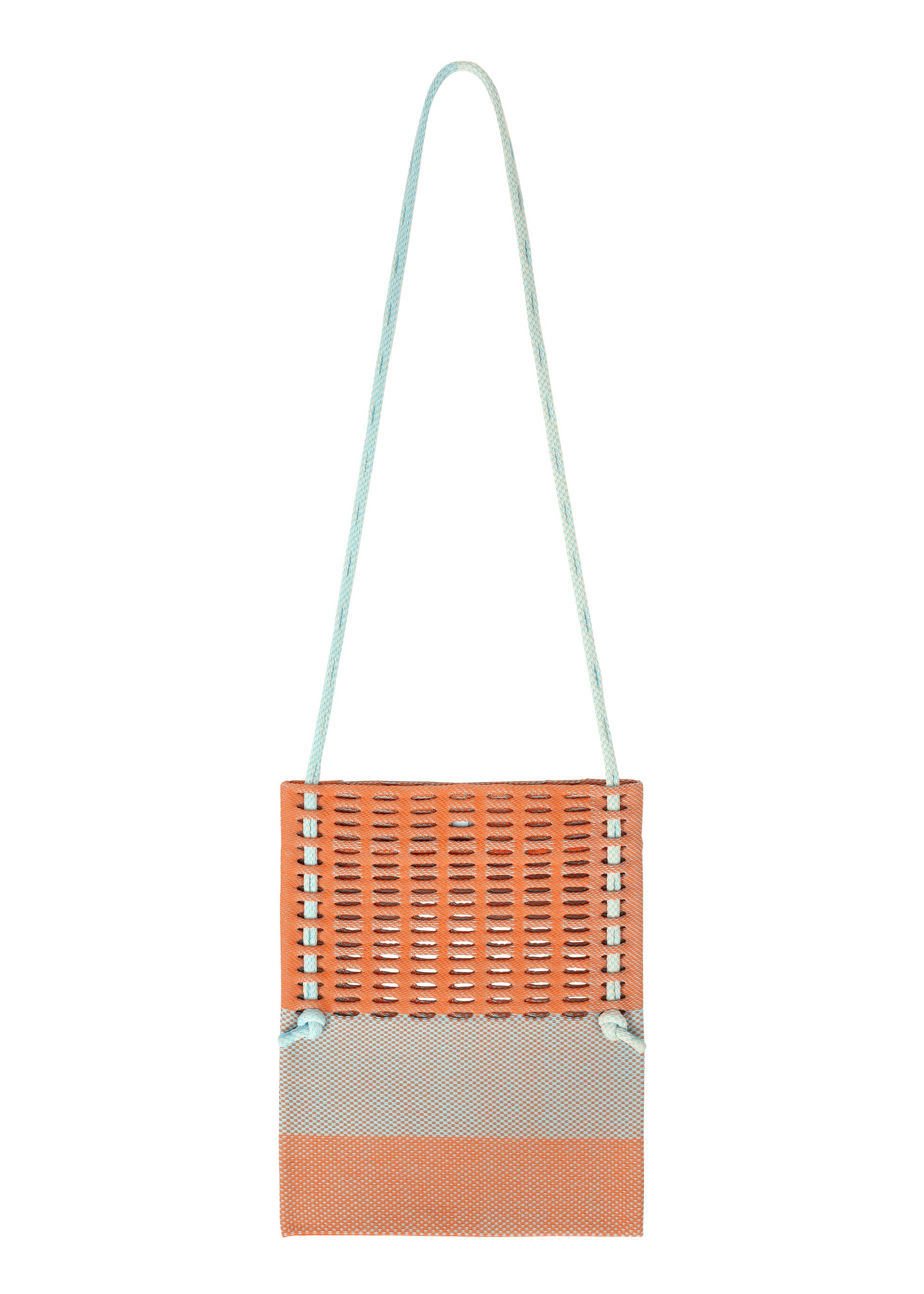A product shot of the GOOD GOODS ISSEY MIYAKE MOKKO KNOT bag in warm orange mix.