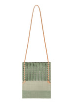A product shot of the GOOD GOODS ISSEY MIYAKE MOKKO KNOT bag in jade green mix.