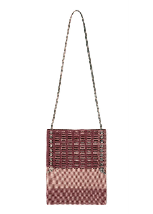 A product shot of the GOOD GOODS ISSEY MIYAKE MOKKO KNOT bag in burgundy mix.