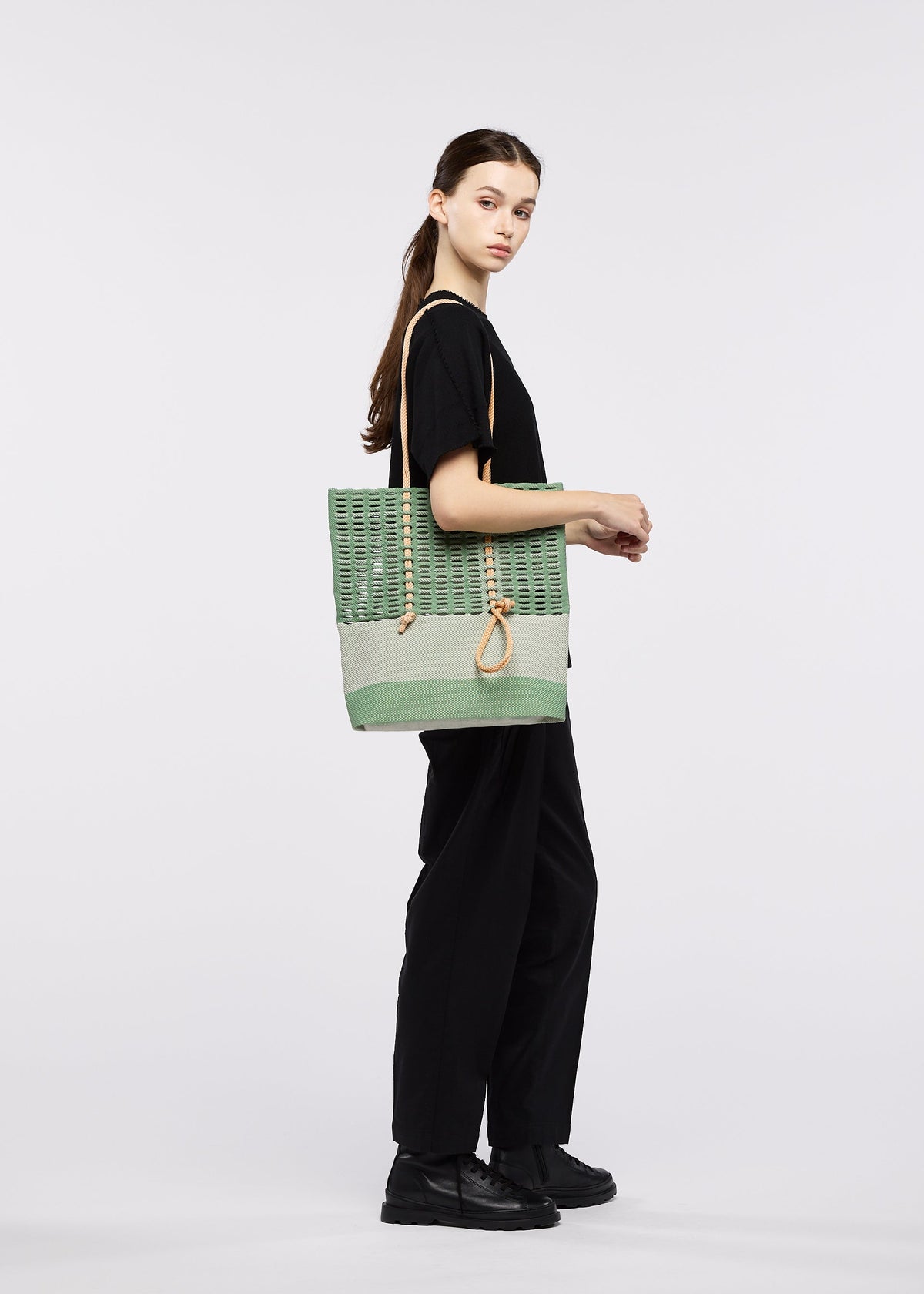 A model wears the GOOD GOODS ISSEY MIYAKE MOKKO KNOT mokko-knot-5.