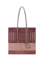 A product shot of the GOOD GOODS ISSEY MIYAKE MOKKO KNOT bag in burgundy mix.