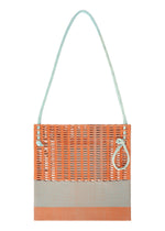A detail shot of the GOOD GOODS ISSEY MIYAKE MOKKO KNOT bag.