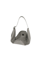 A detail shot of the GOOD GOODS ISSEY MIYAKE LEAF bag.