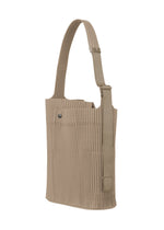 A detail shot of the Homme Plisse Issey Miyake UTILITY bag.