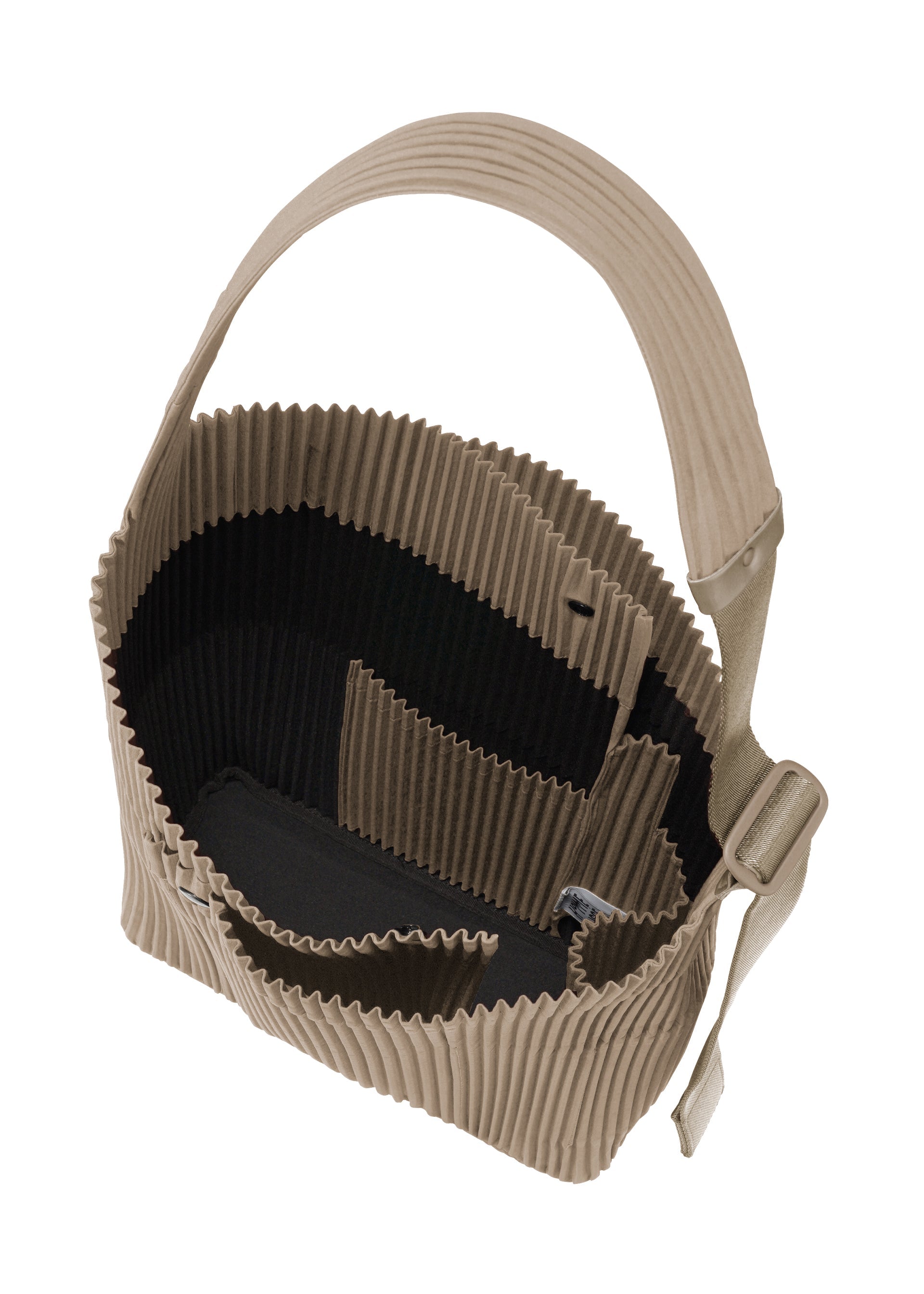 A detail shot of the Homme Plisse Issey Miyake UTILITY bag.