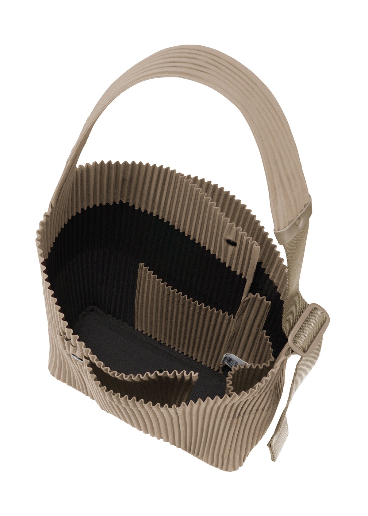 A detail shot of the Homme Plisse Issey Miyake UTILITY bag.