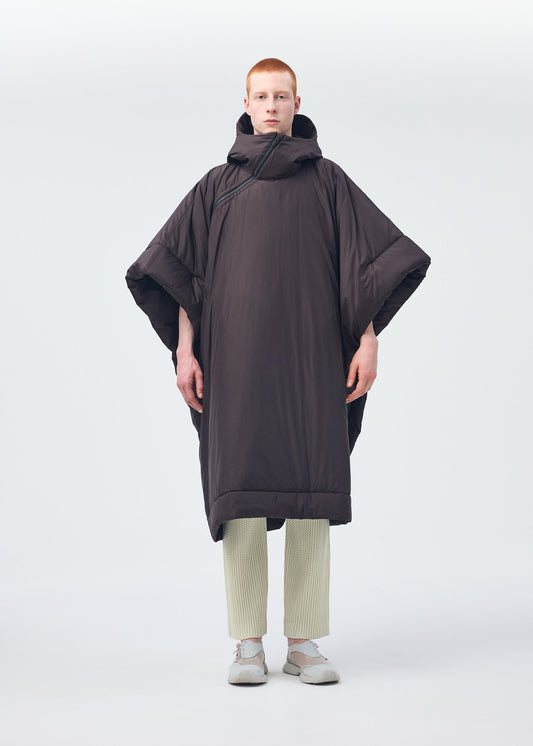 A model wears the Homme Plisse Issey Miyake DUVET COAT coat.