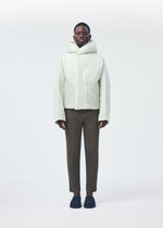 A model wears the Homme Plisse Issey Miyake DUVET COAT blouson.