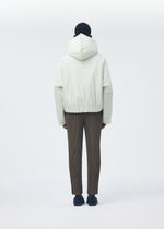 A model wears the Homme Plisse Issey Miyake DUVET COAT blouson.
