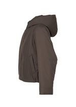 A detail shot of the Homme Plisse Issey Miyake DUVET COAT blouson.