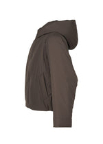 A detail shot of the Homme Plisse Issey Miyake DUVET COAT blouson.