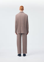 A model wears the Homme Plisse Issey Miyake KERSEY PLEATS jacket.