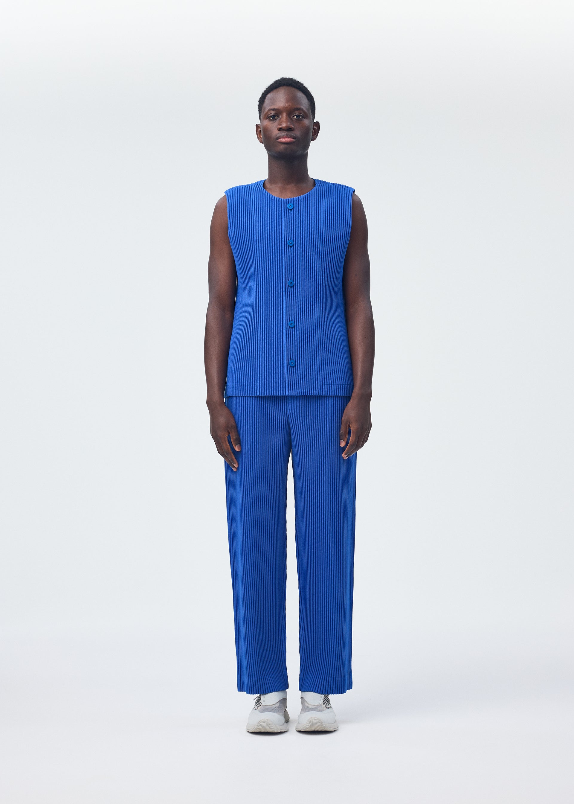 A model wears the Homme Plisse Issey Miyake KERSEY PLEATS vest.