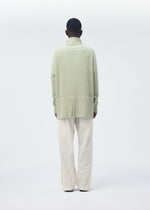 A model wears the Homme Plisse Issey Miyake QUARRY Trousers trousers.