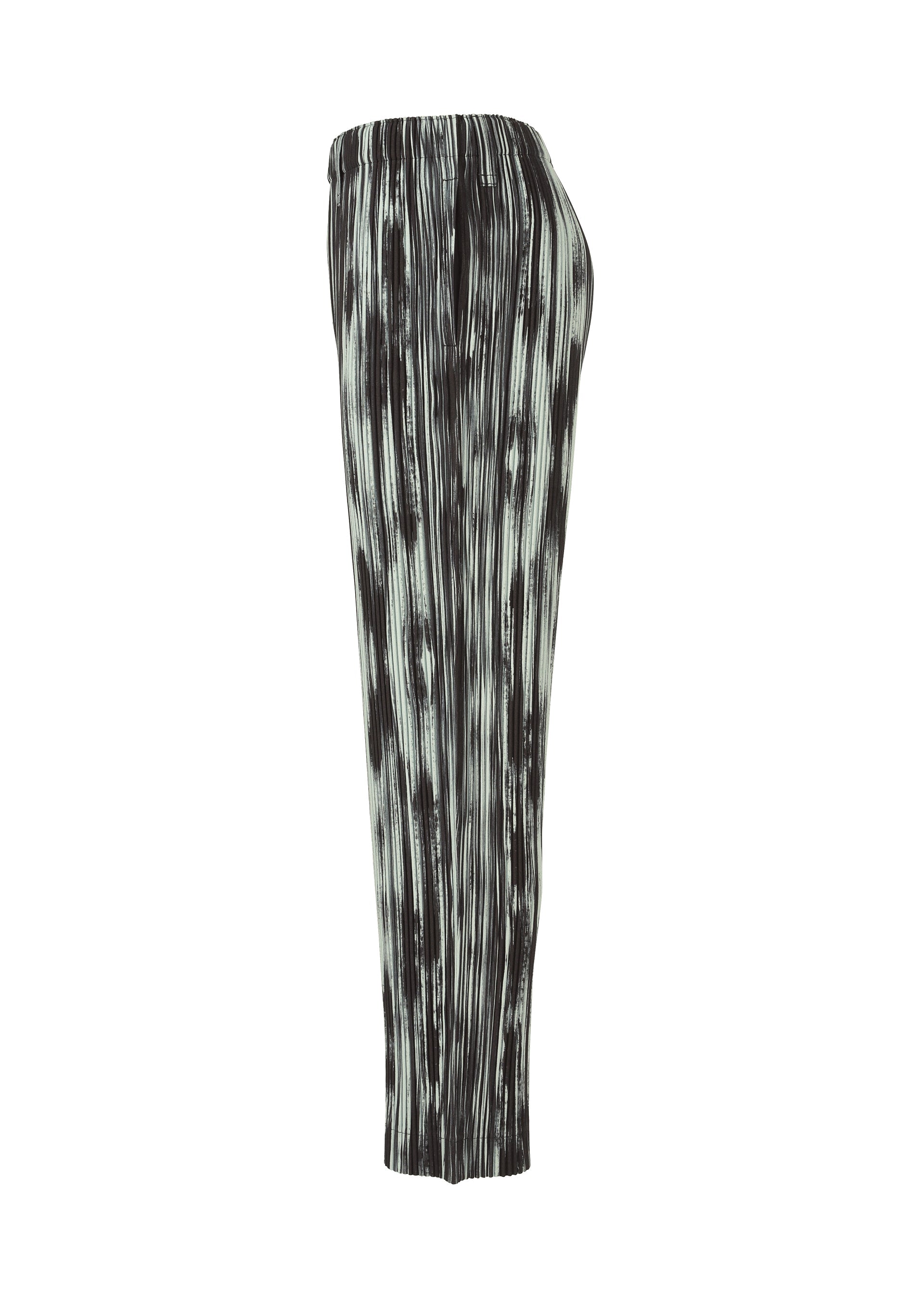 A detail shot of the HOMME PLISSÉ ISSEY MIYAKE BRUSHSTROKE STRIPE trousers.