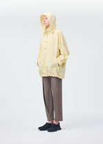 A model wears the Homme Plisse Issey Miyake PADDED RIM SHIRT shirt.