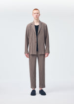 A model wears the Homme Plisse Issey Miyake TAILORED PLEATS 1 jacket.
