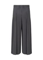 A detail shot of the Homme Plisse Issey Miyake MONTHLY COLORS : DECEMBER trousers.