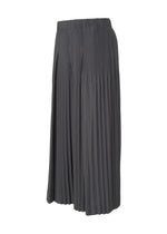 A detail shot of the Homme Plisse Issey Miyake MONTHLY COLORS : DECEMBER trousers.