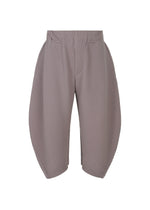 A product shot of the HOMME PLISSÉ ISSEY MIYAKE PLEATS BOTTOMS 1 trousers in burnt purple (85).
