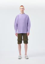 A model wears the Homme Plisse Issey Miyake PLEATS BOTTOMS 2 trousers.