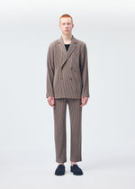 A model wears the Homme Plisse Issey Miyake TAILORED PLEATS 1 trousers.