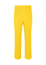 A product shot of the HOMME PLISSÉ ISSEY MIYAKE COLOR PLEATS trousers in citrine yellow (51).