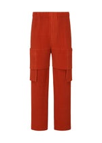 A product shot of the HOMME PLISSÉ ISSEY MIYAKE MULTI POCKET trousers in jasper red (25).