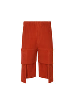 A product shot of the HOMME PLISSÉ ISSEY MIYAKE MULTI POCKET trousers in jasper red (25).