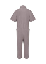 A detail shot of the HOMME PLISSÉ ISSEY MIYAKE PLEATS BOTTOMS 1 jumpsuit.