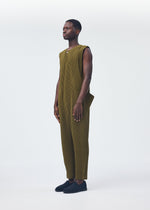 A model wears the Homme Plisse Issey Miyake PLEATS BOTTOMS 2 jumpsuit.