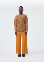 A model wears the Homme Plisse Issey Miyake MONTHLY COLORS : OCTOBER shirt.