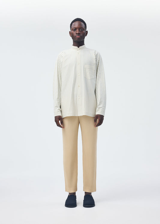 A model wears the Homme Plisse Issey Miyake STRIPE JERSEY SHIRT prêt à porter.