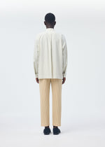 A model wears the Homme Plisse Issey Miyake STRIPE JERSEY SHIRT prêt à porter.