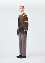 A model wears the Homme Plisse Issey Miyake AGATE KNIT top.