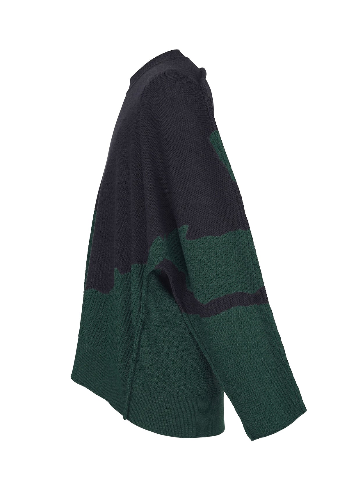 A detail shot of the Homme Plisse Issey Miyake AGATE KNIT top.